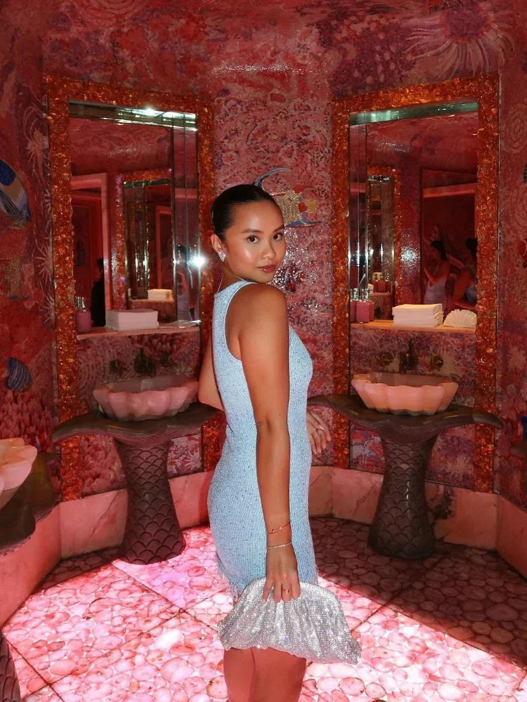 Women's Sparkly Knit Mini Dress with Sleeveless Cut and Fringe Hem